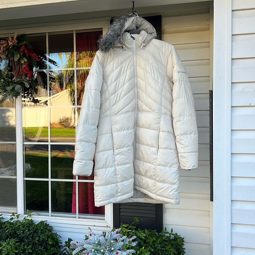 Cream colored Columbia puffer with fur hood also has removable hood